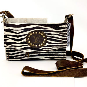 
                
                    Load image into Gallery viewer, Small Zebra Hide &amp;#39;Jordan&amp;#39; Crossbody with Genuine LV Patch by Keep It Gypsy
                
            